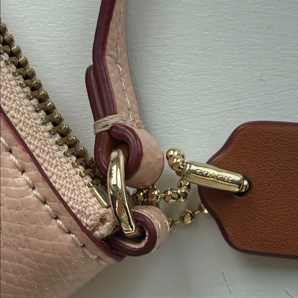 Coach Pink Floral Cutout Wristlet - Picture 2 of 6
